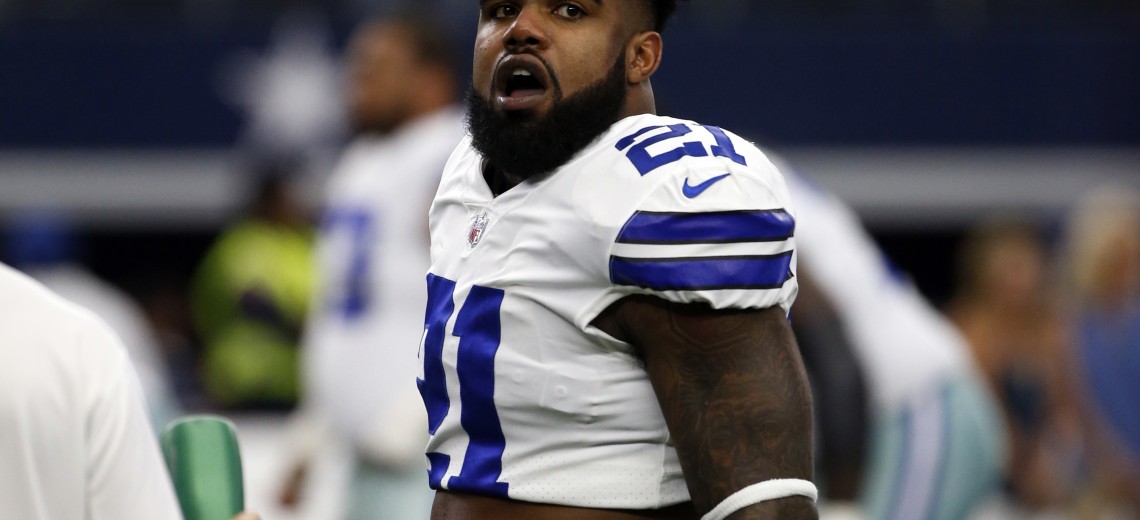 In this Oct. 1, 2017, photo, Dallas Cowboys' Ezekiel Elliott stands on the field during warmups before an NFL football game against the Los Angeles Rams in Arlington, Texas. Attorneys for Elliott are set for an emergency hearing in federal court in New York as they try again to stop the running back's six-game suspension over domestic violence allegations, a person with direct knowledge of the situation told The Associated Press on Monday night, Oct. 16. (AP Photo/Ron Jenkins)