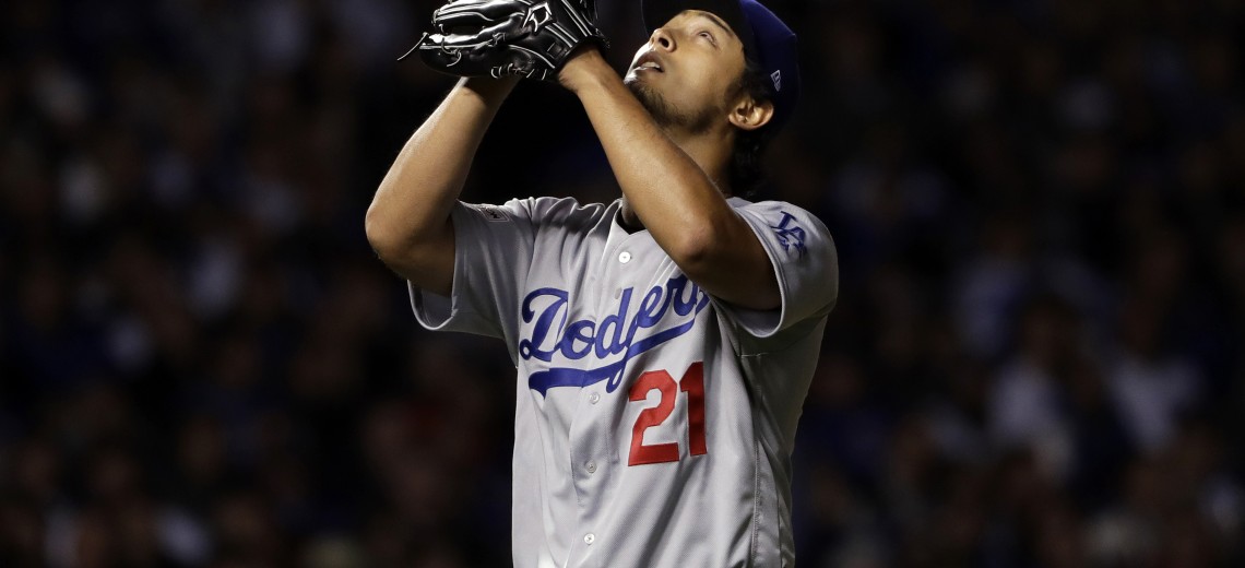 Los Angeles Dodgers starting pitcher Yu Darvish (21) looks up the sky as he leaves during the seventh inning of Game 3 of baseball's National League Championship Series against the Chicago Cubs, Tuesday, Oct. 17, 2017, in Chicago. (AP Photo/Matt Slocum)