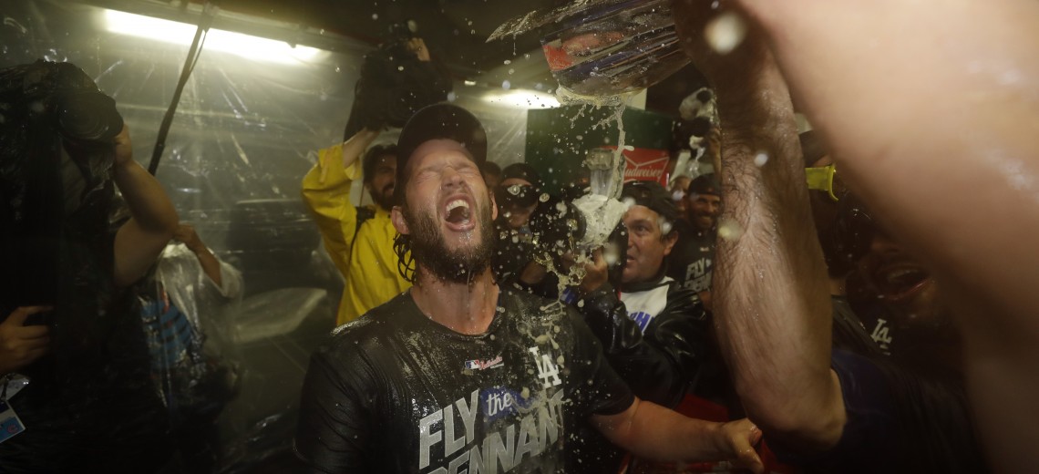 Los Angeles Dodgers' Clayton Kershaw and his teammates celebrate after Game 5 of baseball's National League Championship Series against the Chicago Cubs, Thursday, Oct. 19, 2017, in Chicago. The Dodgers won 11-1 to win the series and advance to the World Series. (AP Photo/Matt Slocum)